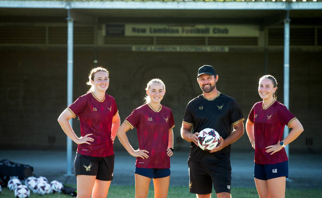 From left, New Lambton players Serena Carter, Nyah Bradley and Amy Gosling with coach Aaron Stedman. Picture by Jonathan Carroll