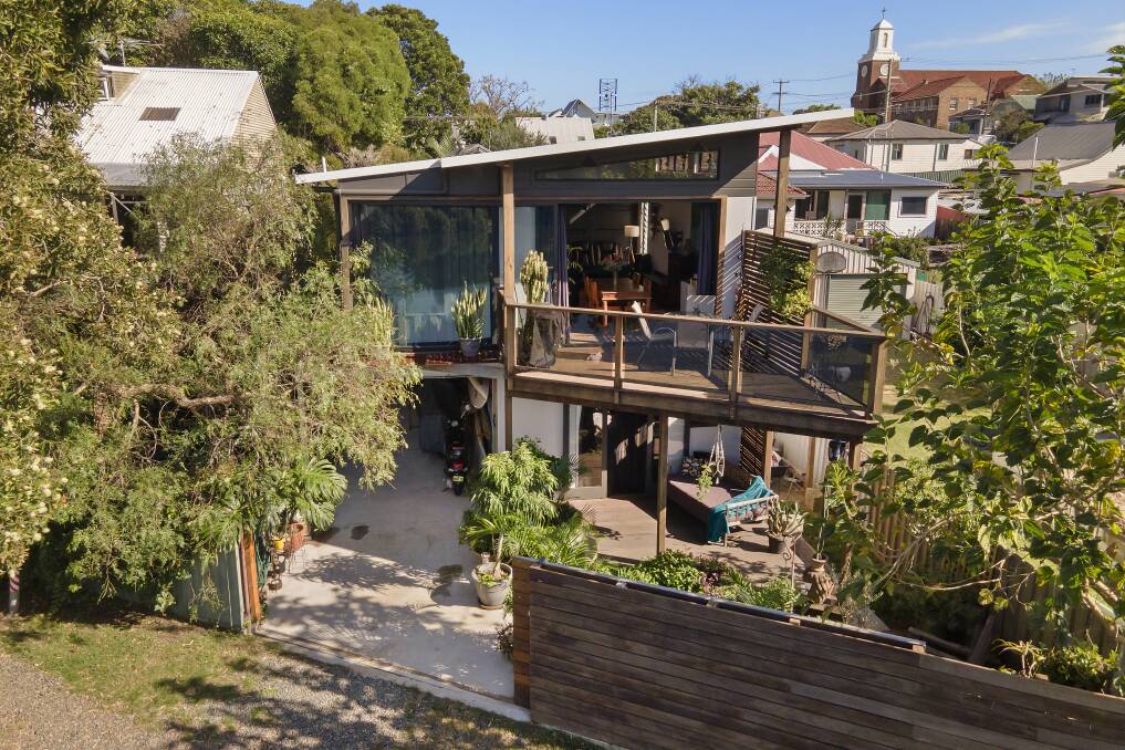 DOUBLE OFFERING: This home made out of shipping containers was part of a Tighes Hill property which sold for $1.8 million on Wednesday.