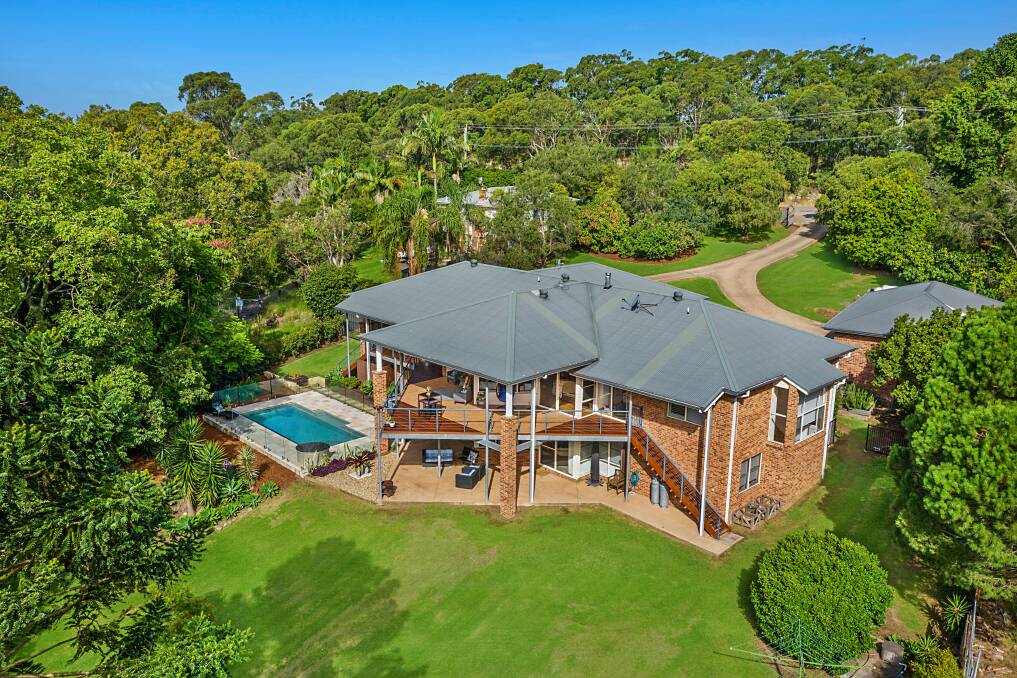 MINI ACREAGE: This property features a six-bedroom residence and pool on almost three acres of land and could set a new suburb sale price for Jewells.