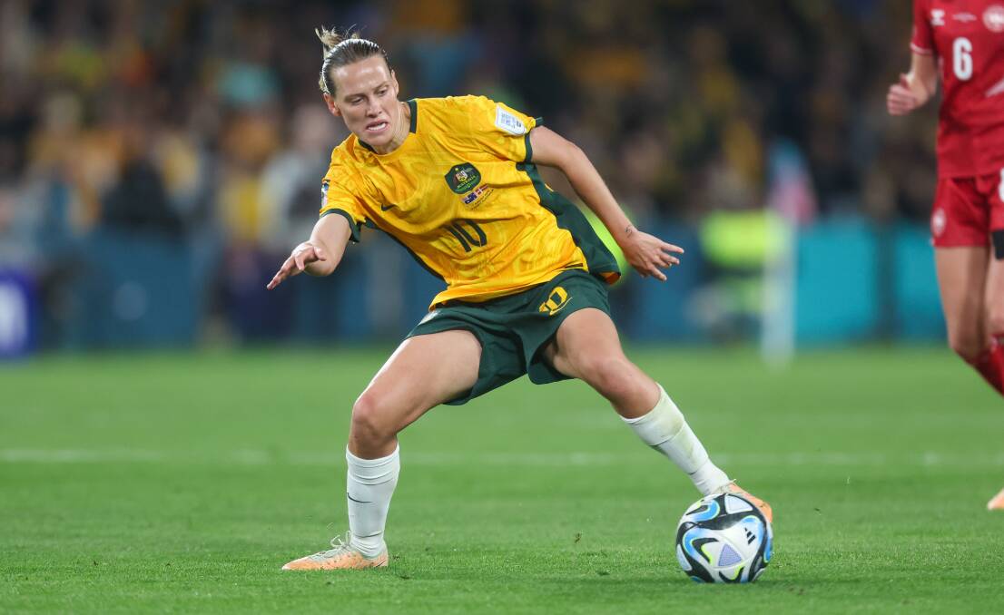 Emily van Egmond in action against Denmark in the World Cup round of 16 at Stadium Australia on Monday night. Picture by Adam McLean