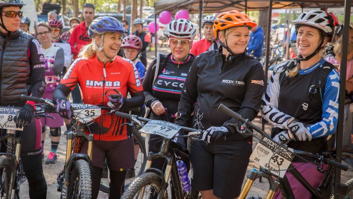FUN: Juliana Wisata, with orange helmet, on the start line of last year's women's only Diamonds in the Dirt mountain bike riding event at Awaba. Picture: OuterImage.com.au