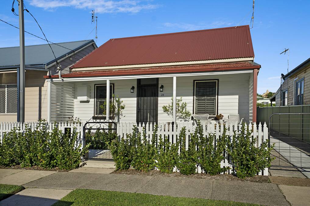 STRONG INTEREST: Twenty-two bidders registered for the auction of this Waratah property, which sold for a street record $830,000.