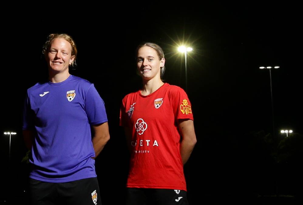 Broadmeadow Magic goalkeeper Alison Logue and striker Ash Brodigan proved key in a 2-0 win over defending champions Newcastle Olympic in round two of Herald Women's Premier League. Picture: Jonathan Carroll