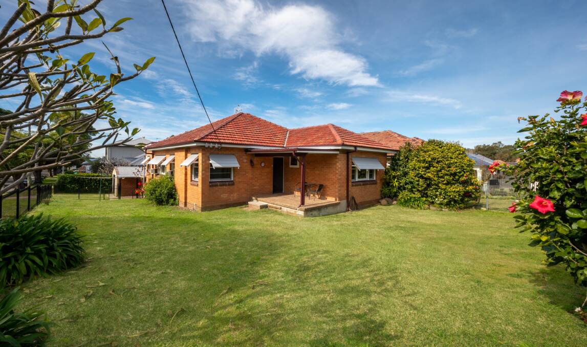 This four-bedroom house on a corner block at 10 Orchardtown Road, New Lambton has an auction guide of $740,000.