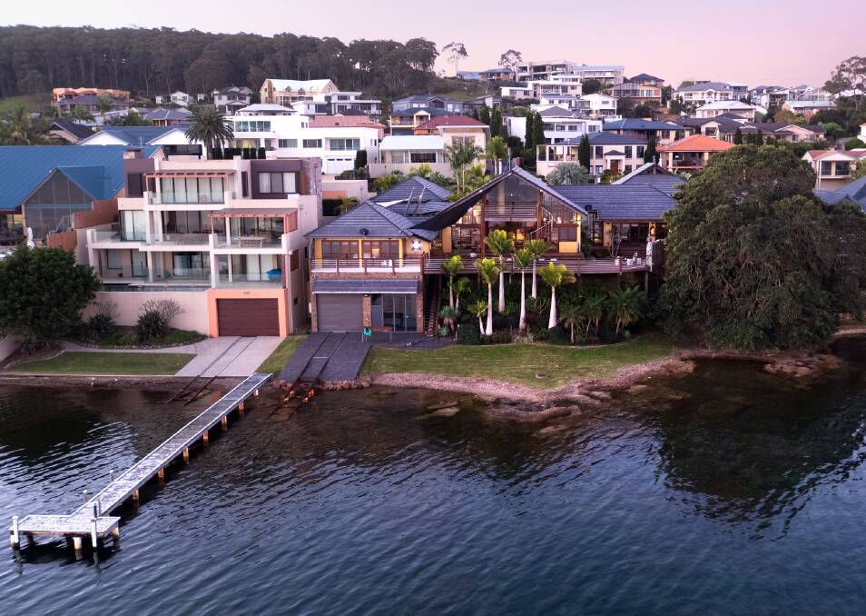 BIG RESULT: A local buyer has secured the waterfront home of former Newcastle lord mayor Jeff McCloy for what is understood to be a record sale.
