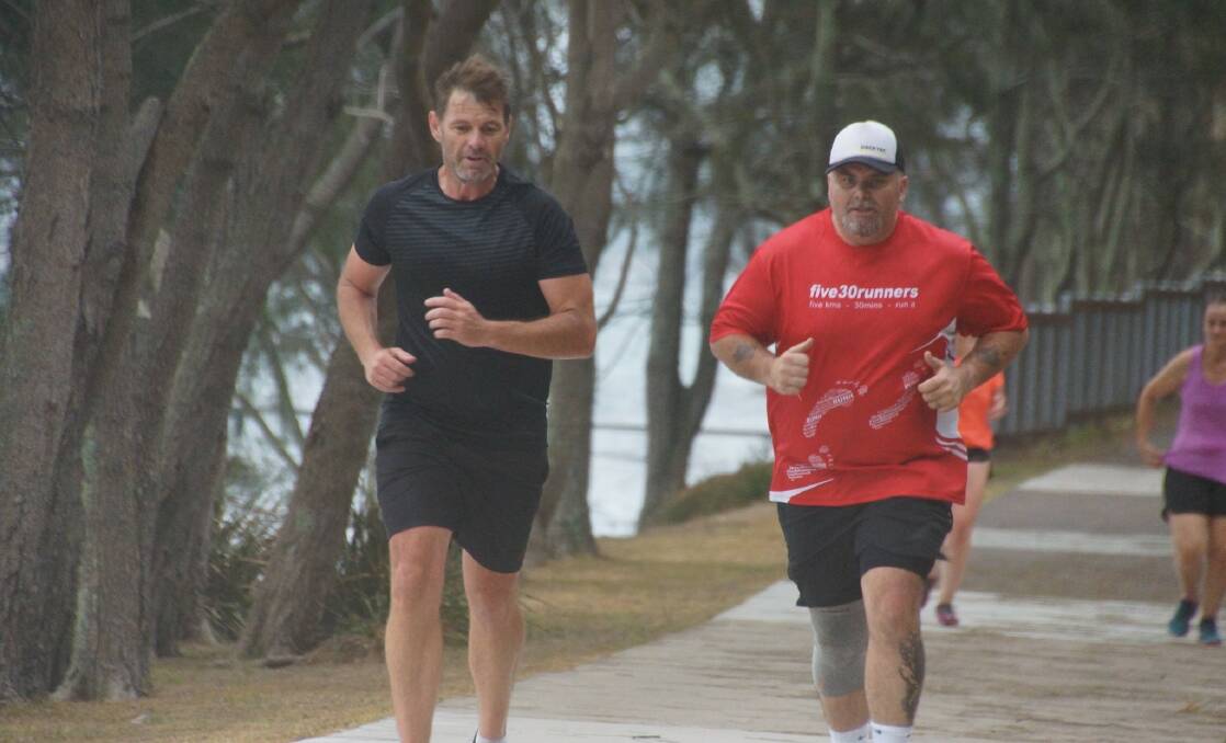 NEW CHALLENGE: Chad Wardle, right, is a parkrun regular and will participate in his first trail run at the Coastal Ascent in Newcastle on February 16. Picture: Supplied