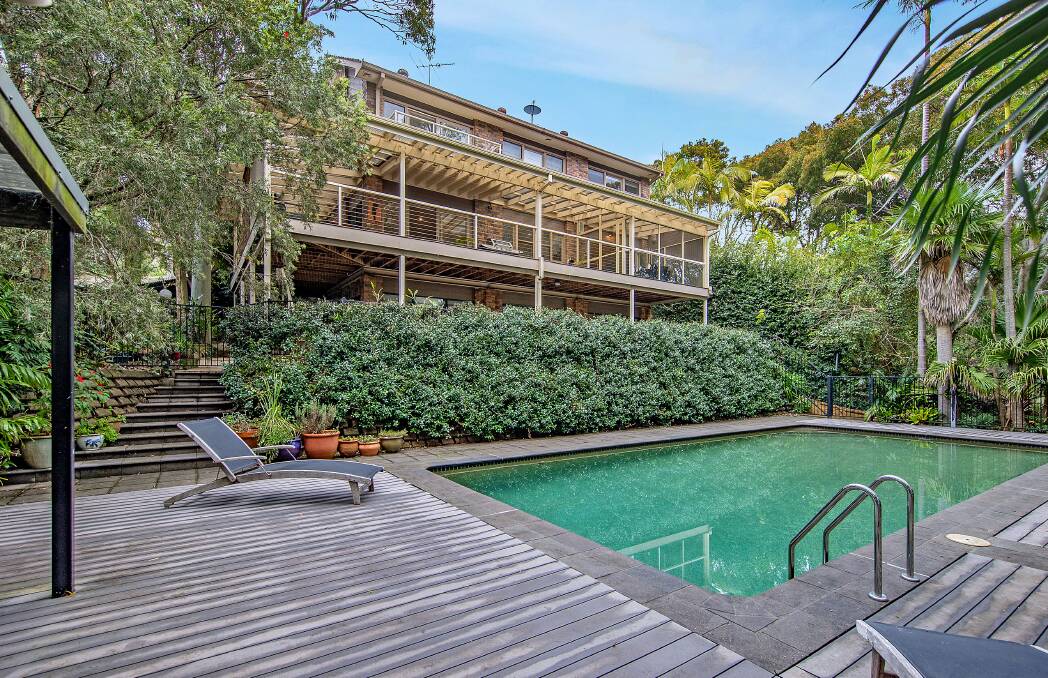 SOLD: This retreat-like Merewether property was secured at auction last weekend for $2.85 million.