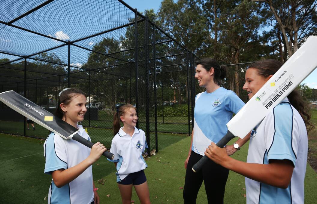 Newcastle Junior Cricket Association administrator Sharon Dare with Valentine Eleebana cricketers, from left, Evie Ford, 12, Makenzie Keast, 11, and Anika McCarthy, 14. Picture by Simone De Peak