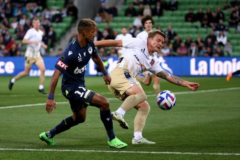 Jets left-back James McGarry was deemed to have made contact with Melbourne Victory's Nani for a controversial penalty in the opening stages of their clash at AAMI Park on Friday night. Picture Getty Images