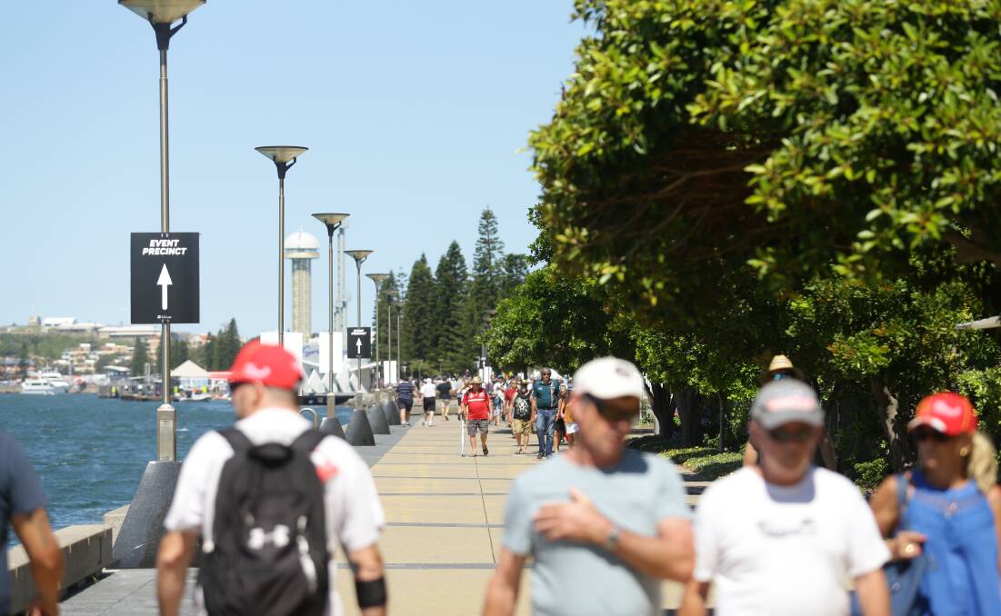 ON FOOT: The path along the harbour was well worn from the Newcastle 500 precinct to the Newcastle Interchange during the three days of the Supercars final round. Picture: Jonathan Carroll