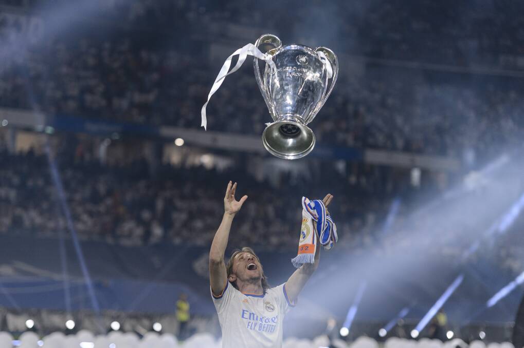 Real Madrid's Luka Modric celebrates winning the UEFA Champions League Trophy at Santiago Bernabeu Stadium on May 29. Picture: Getty Images