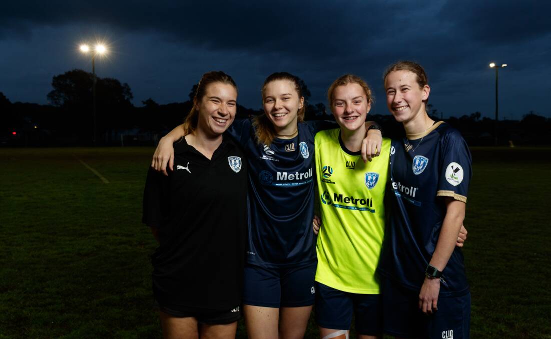 From left, New Lambton coach Mackenzie Davis with players Imogen May, Larissa Stace and Emily Ridgeway. They have all taken plenty of positives out of this NPLW Northern NSW season. Picture: Max Mason-Hubers