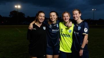 From left, New Lambton coach Mackenzie Davis with players Imogen May, Larissa Stace and Emily Ridgeway. They have all taken plenty of positives out of this NPLW Northern NSW season. Picture: Max Mason-Hubers