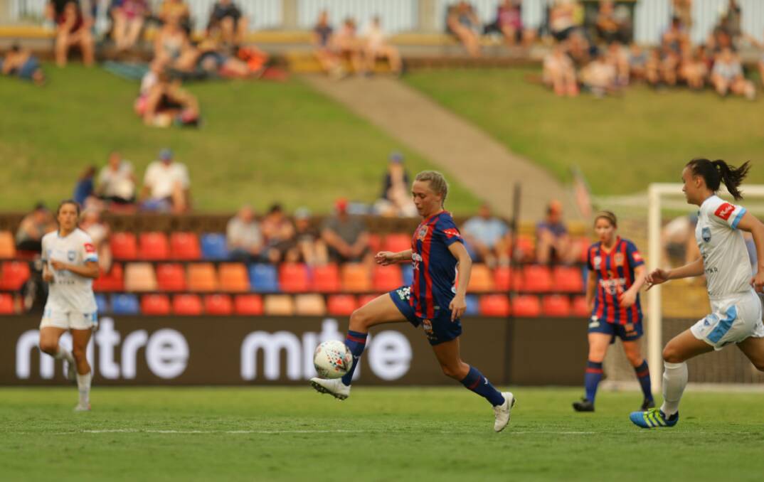 GONE: Midfielder Libby Copus-Brown, in action for Newcastle last W-League season, has signed with Western Sydney. Picture: Jonathan Caroll