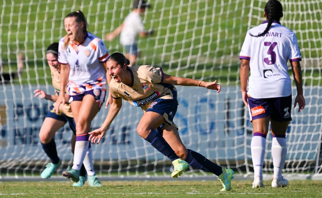 Mindy Barbieri celebrates after producing the equaliser against Perth at Maitland Sportsground on Sunday. Picture Getty