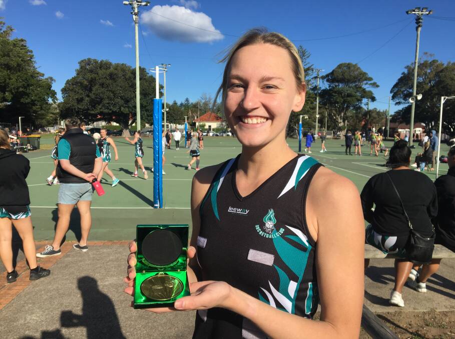 BNC's Claudia Rodwell with the Lois and Nola Green Medal for Newcastle Netball Association's Most Valuable Player in 2020. Picture: Renee Valentine