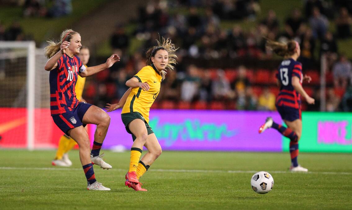Newcastle's Clare Wheeler, pictured playing against the US at McDonald Jones Stadium last November, has been named in the Matildas squad for two friendlies in Europe this month. Picture: Max Mason-Hubers