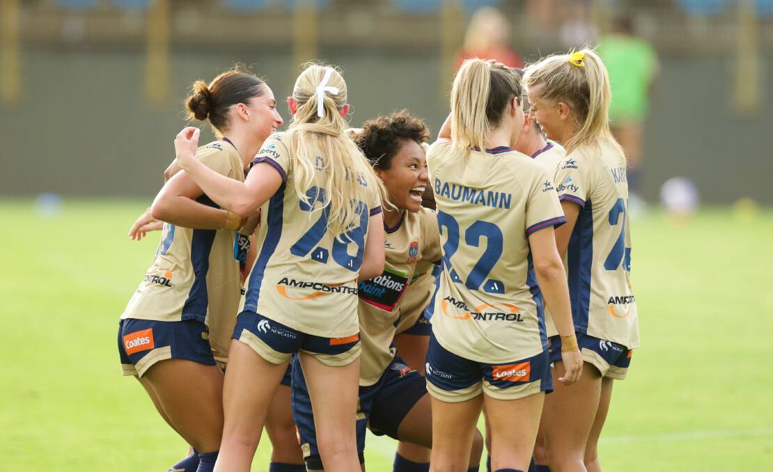 The Jets celebrate after striker Sarina Bolden produces the winner against Wellington at No.2 Sportsground on Sunday. Picture by Jonathan Carroll