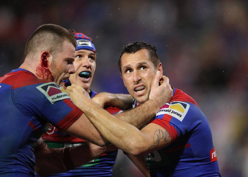 Mitchell Pearce, right, believes Kalyn Ponga, middle, could play in the halves for the Knights and is a fan West Tigers halfback Luke Brooks. Picture: Max Mason-Hubers