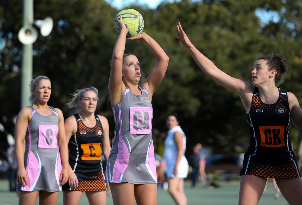Round-four action in Newcastle championship netball at National Park Netball Courts on Saturday. Pictures: Marina Neil