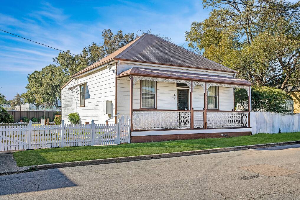 POTENTIAL: This three-bedroom cottage in Maryville has a 15-metre frontage and side driveway access to a double garage. It goes to auction with a guide of $650,000.