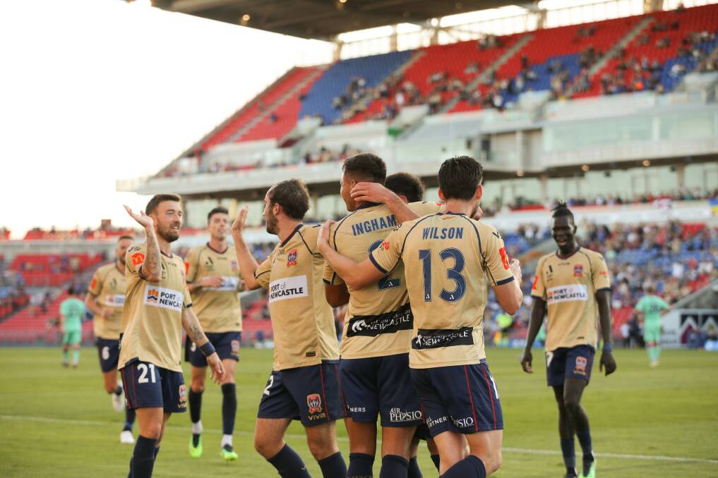 The Newcastle Jets celebrate a goal against Perth Glory at McDonald Jones Stadium in April. Picture: Max Mason-Hubers