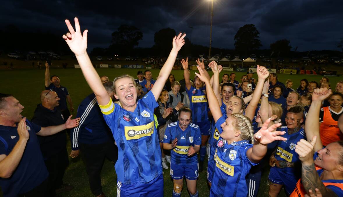 Newcastle Olympic captain and centre-back Sophie O'Brien celebrates after winning the 2020 Herald Women's Premier League grand final at Macquarie Field. Picture: Jonathan Carroll