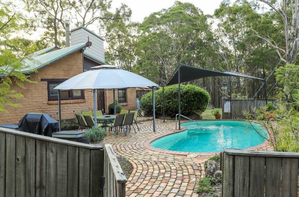 SOLD: $850,000 was paid for a mud-brick home and cottage in Ellalong's Wallaby Gully Road.