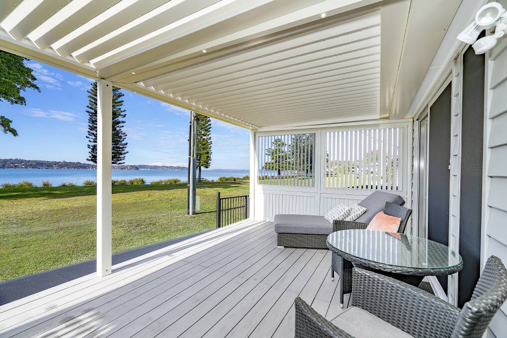 This waterfront home at 16 Nanda Street in Marmong Point has a guide of $1.9 million to $2 million.