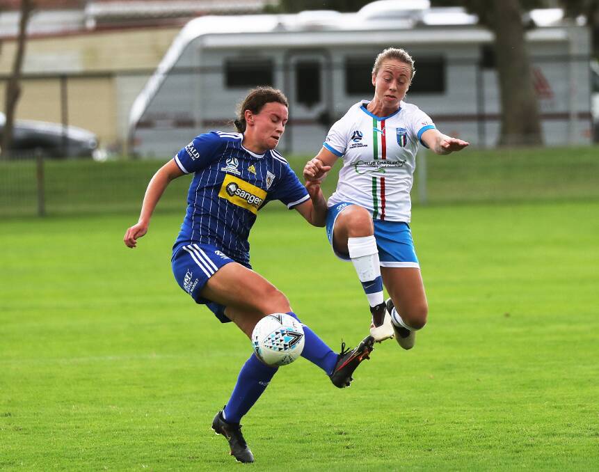 FINISHED UP: Charlestown Azzurri's high-profile signing Jenna Kingsley, right, will not play out the remainder of the NPLW Northern NSW season due to work commitments. Picture: Peter Lorimer