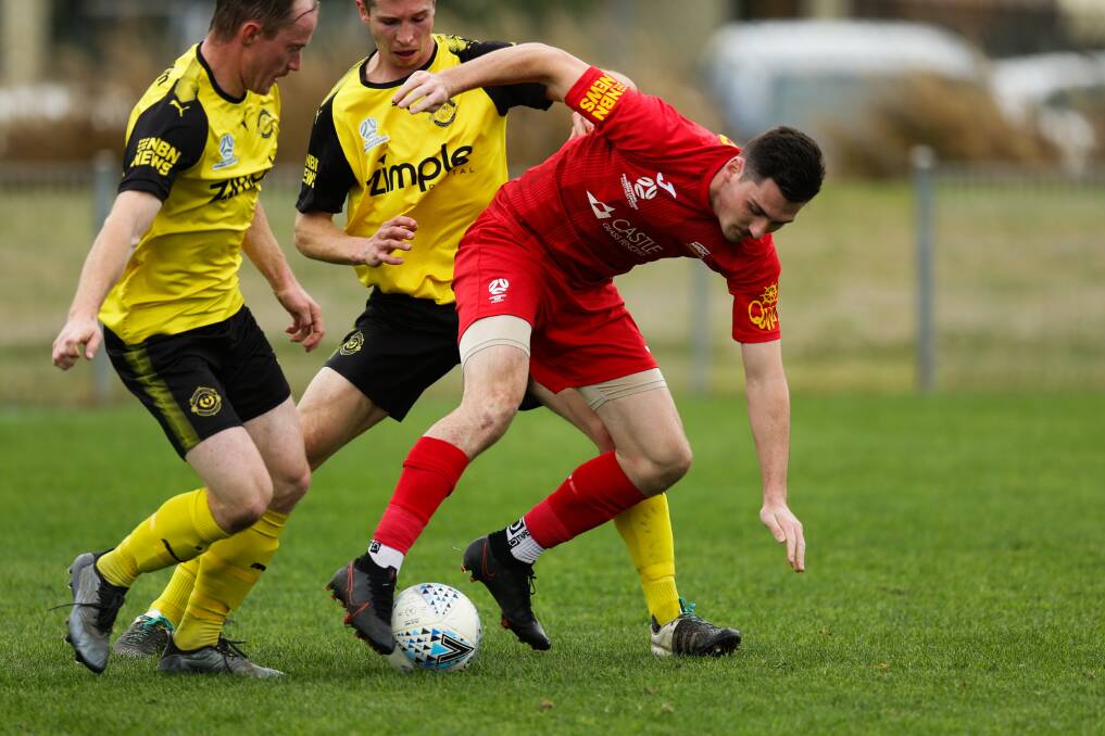 DOUBLE DELIGHT: Broadmeadow's Jacob Dowse, in red and pictured in action last season, proved instrumental for Magic on Saturday. Picture: Jonathan Carroll
