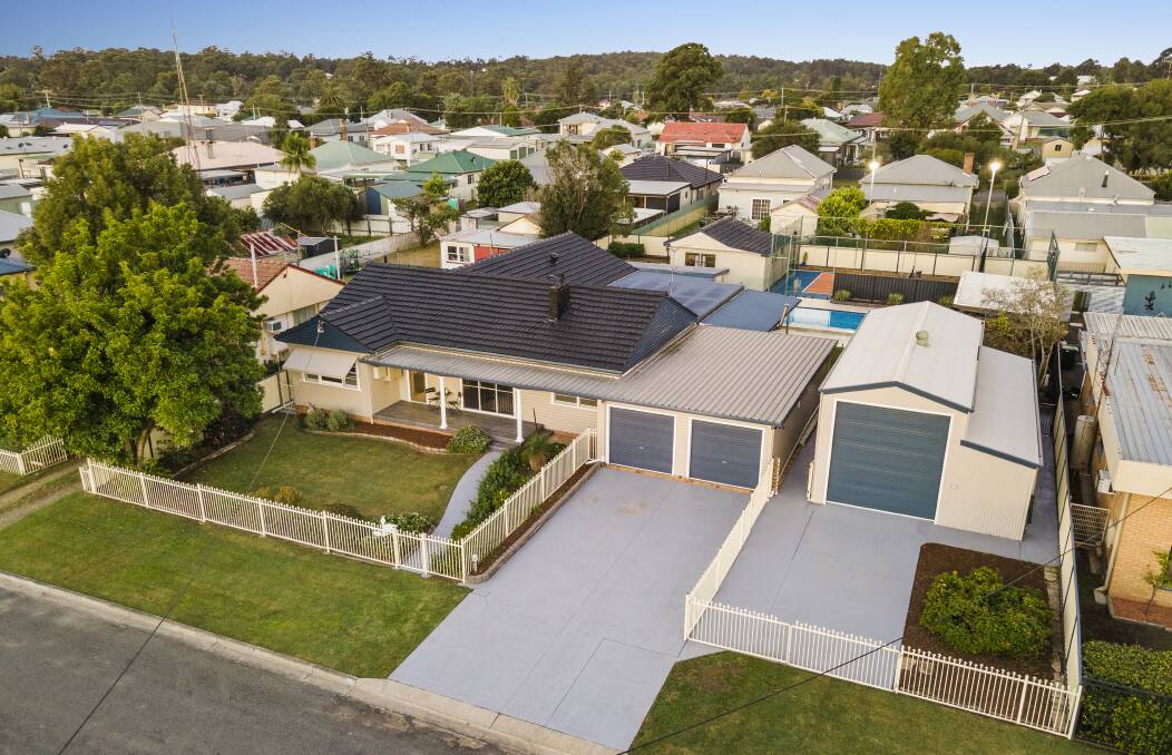 UNIQUE: This Cessnock property features a four-bedroom house, granny flat, pool, tennis court, triple garage and a shed on a block 1361 square metres in size.