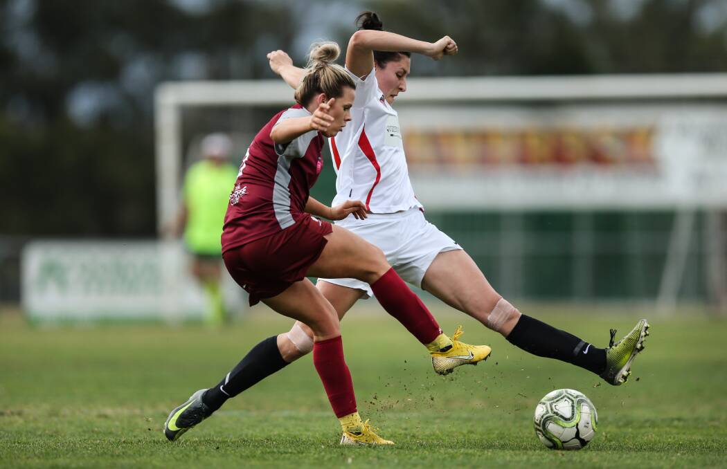 KEY PLAYER: Defender Jamee Ellis, in white, is back in Merewether colours for a modified Herald Women's Premier League season. Picture: Marina Neil