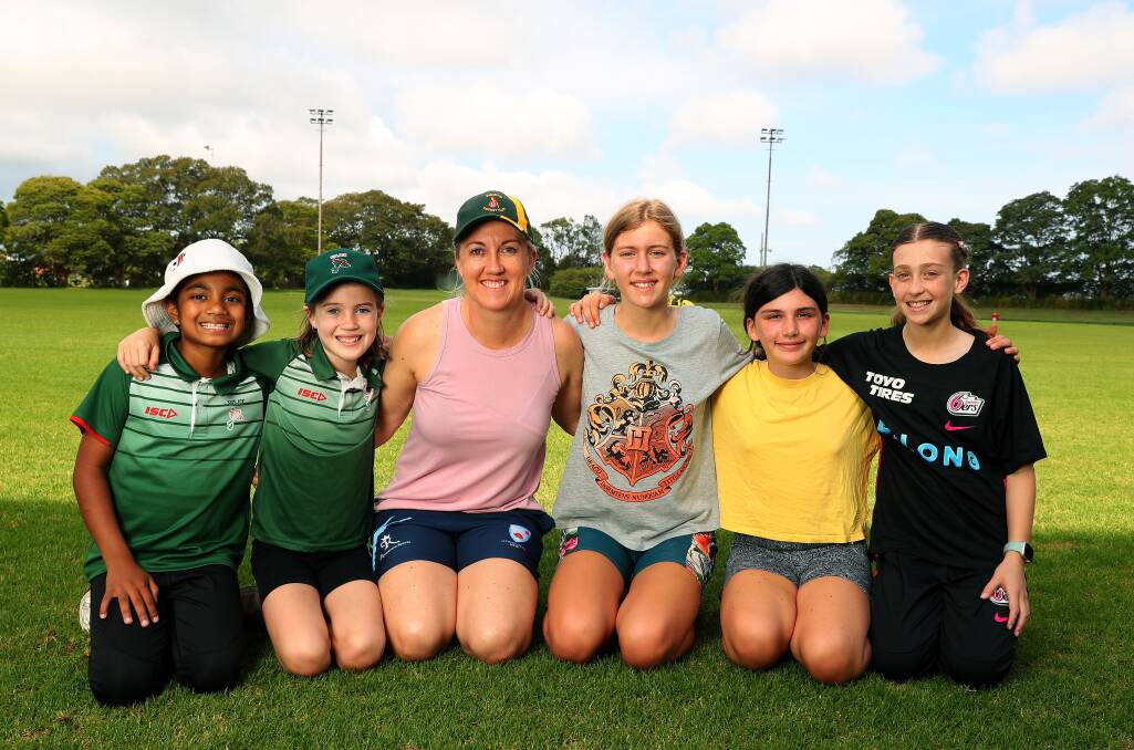 Wests women's captain and stage one girls coach Tighan Tosen with junior players, from left, Suhaina Jahangeer, Scarlett Tosen, Florence McGavin, Miller Baggs and Cora Forbes. Picture by Peter Lorimer