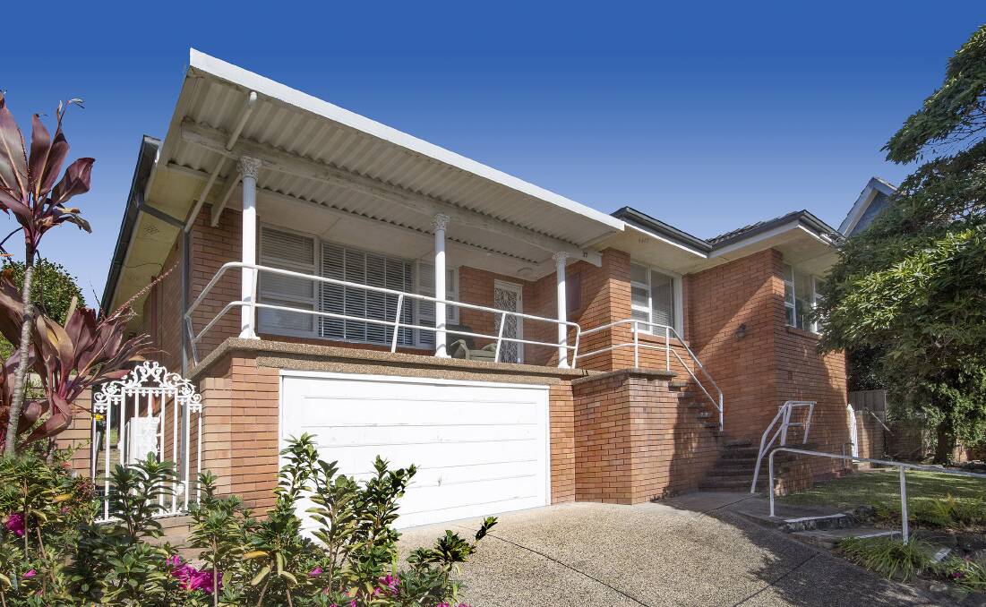 SEVERAL BIDDERS: This brick home in Merewether Heights was secured under the hammer by first home buyers last weekend for $787,000.