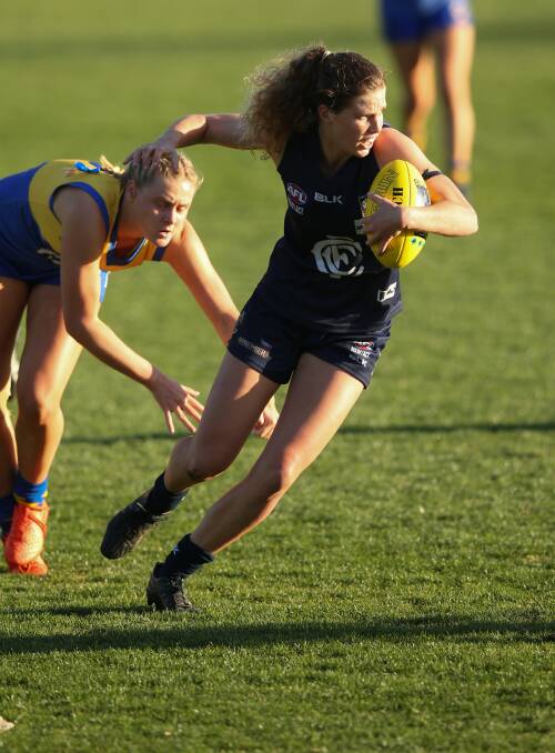 NATURAL TALENT: Sporting allrounder Sarah Halvorsen, in action for Newcastle City in last year's Black Diamond AFL women's grand final, has been picked in the Northern Giants squad. Picture: Max Mason-Hubers