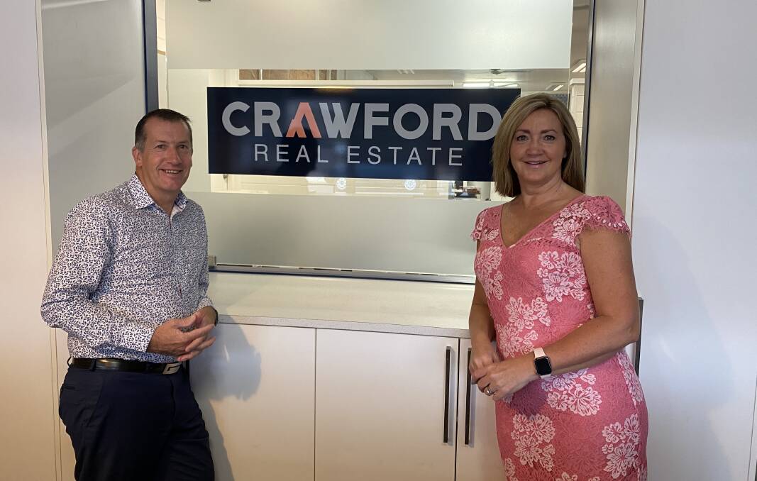 Phil and Amanda Swan have rebranded New Lambton agency Crawford Real Estate.
