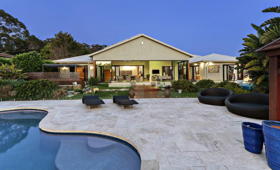 OPULENT: A new suburb record $3.2 million was paid to purchase this Eleebana property at auction last weekend.