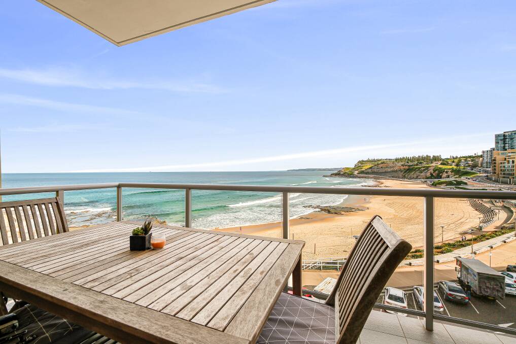 This beachfront apartment in the Azura complex has an auction guide of $1.35 million.