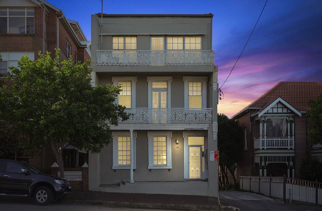 HAMMER TIME: This four-level terrace on The Hill sold at auction last Saturday for $1.8 million.