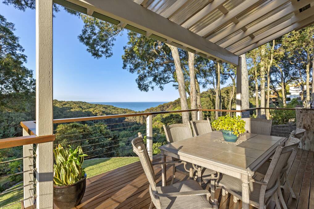 TRANQUIL SETTING: This Dudley house backs on to reserve and has breathtaking bush and water views.