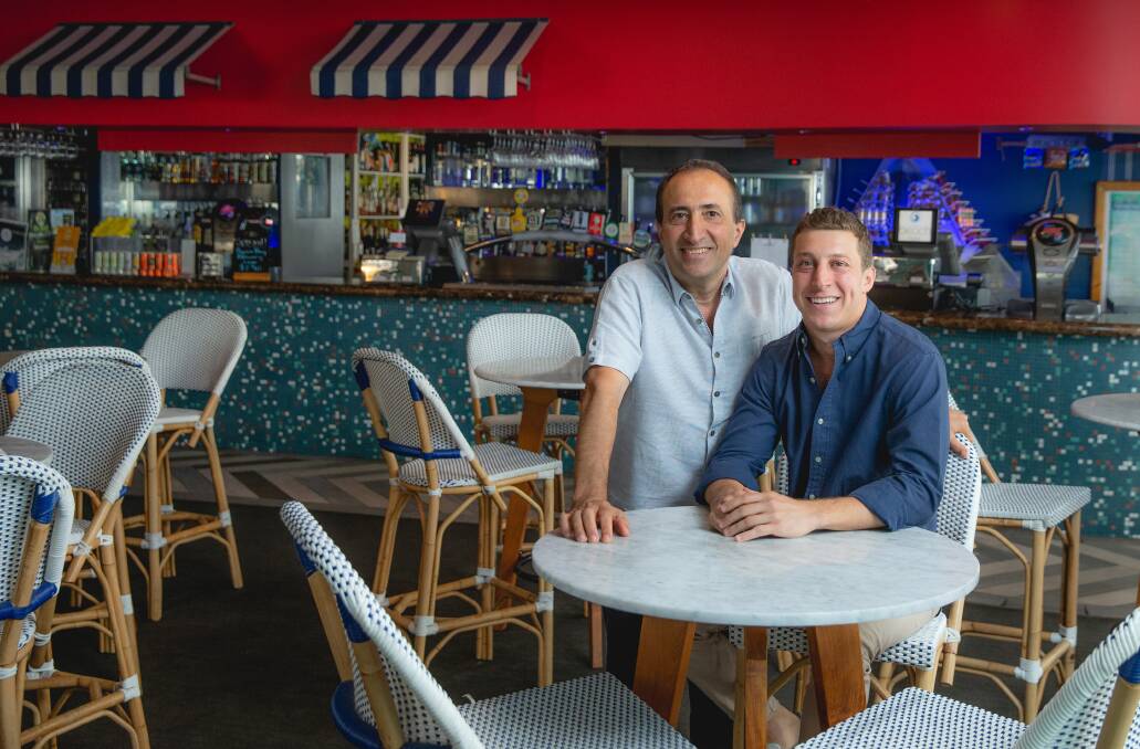 NEW OWNERSHIP: Sydney hotelier Andrew Lazarus, left, with son Peter Lazarus at The Beach Hotel on Friday, has bought Merewether's landmark pub. Picture: Marina Neil