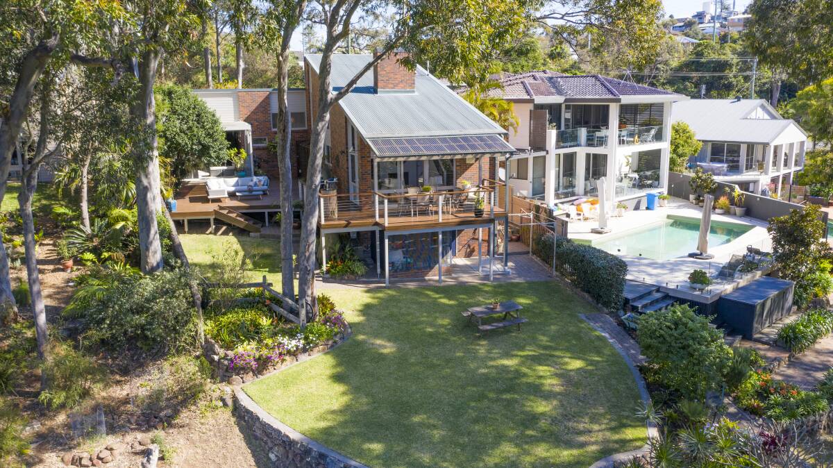 This Dudley house backs on to reserve and has breathtaking bush and water views.