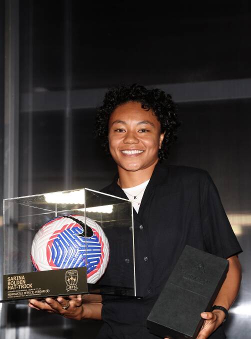 Jets striker Sarina Bolden with her awards on Tuesday night. Picture by Peter Lorimer