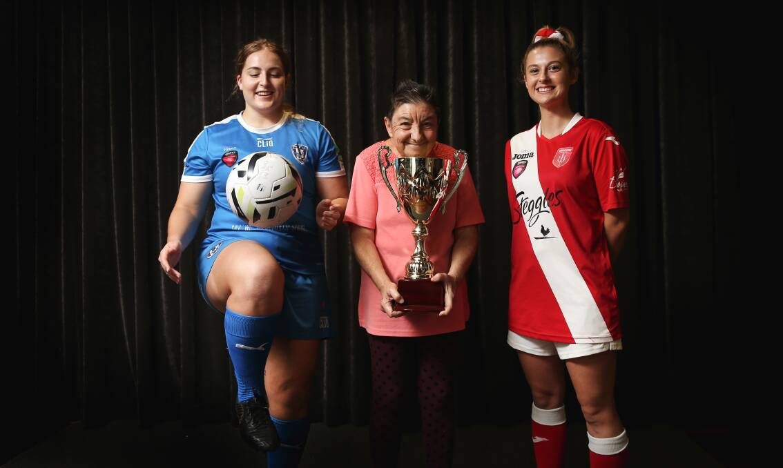 INCLUSIVE: From left, New Lambton's Lisa Cochrane, Janelle Walker and Wallsend's Chloe Kapalos with the Life Without Barriers Cup. Picture: Marina Neil