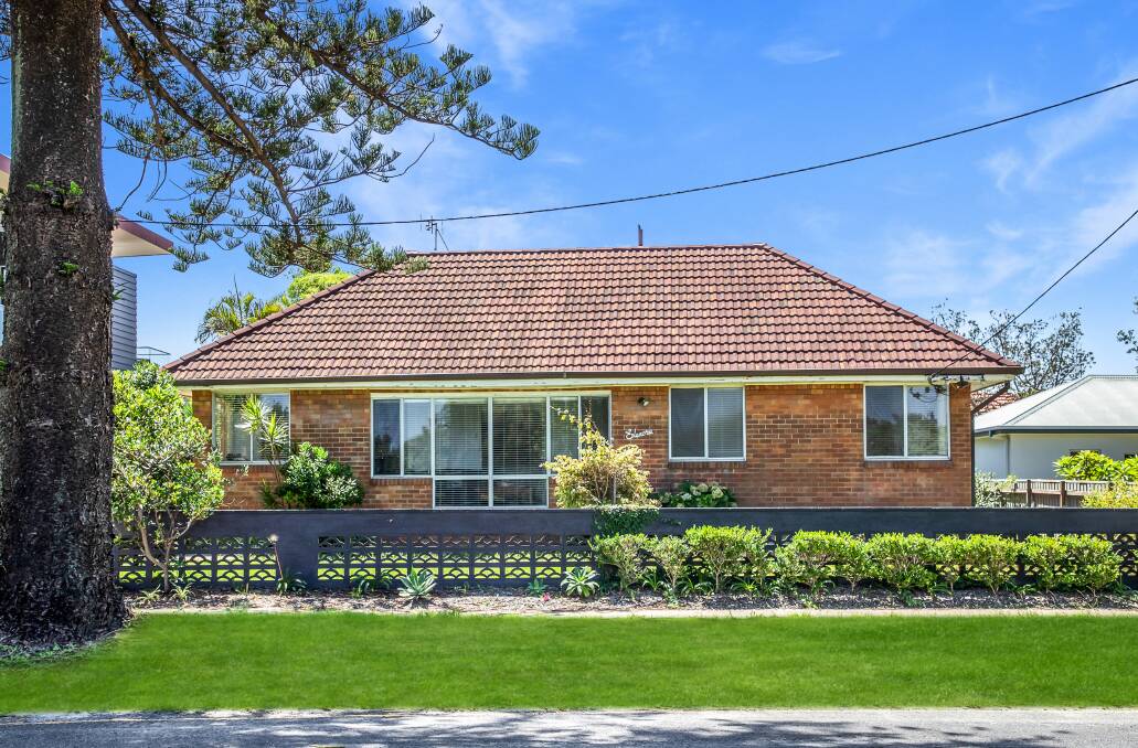 SOUGHT-AFTER POSITION: This single-level house opposite Redhead beach sold under the hammer last weekend for $2.27 million.