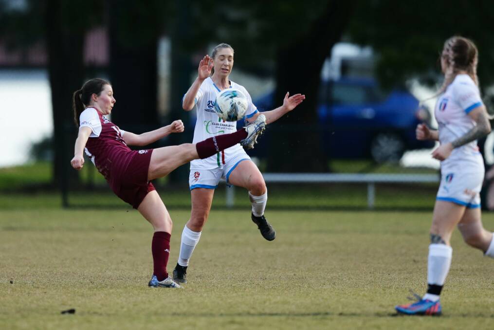 Warners Bay captain Elodie Dagg, left, scored a hat-trick as the Panthers mauled Azzurri at John Street Oval on Sunday. Picture: Jonathan Carroll