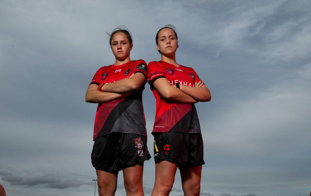 STANDING TALL: Thornton teenagers Ainsley Childs, left, and Taleah Mountford both got on the scoresheet in a tight tussle with Adamstown on Sunday. Picture: Marina Neil