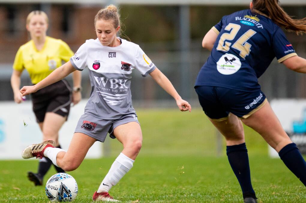 Herald Women's Premier League action between Warners Bay and New Lambton at Arthur Edden Oval. Picture: NNSWF/Chris Simpson