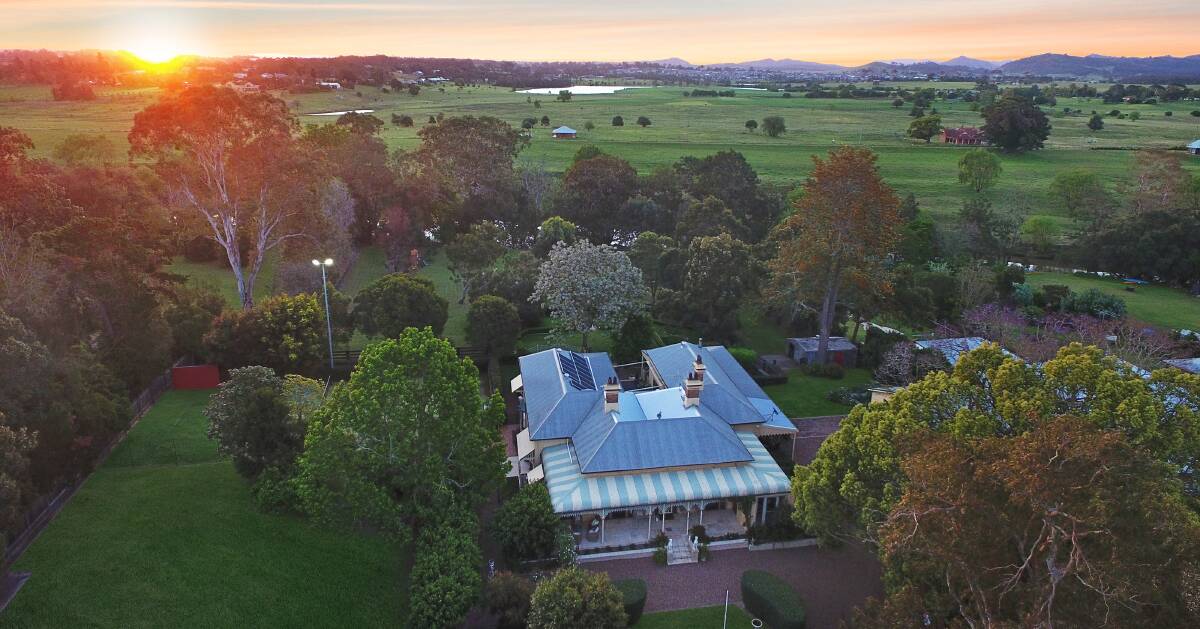 GRANDEUR: This fine Victorian residence is positioned on two-and-a-half acres of riverfront property in Bolwarra and has a guide of $2.2 million to $2.4 million.